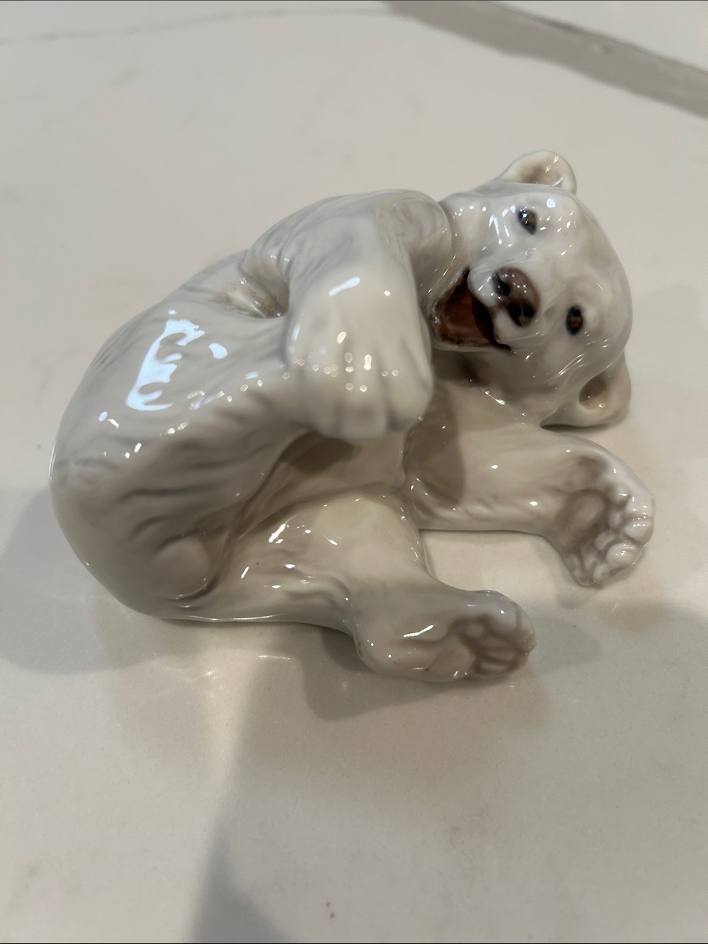 Royal Copenhagen Polar Bear Cub Playing with Foot